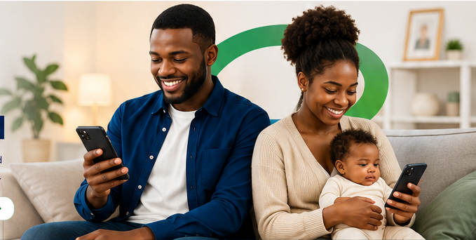 A smiling family using mobile phones at home